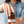 Load image into Gallery viewer, Woman opening a 4oz jar of CBD Cream topical balm for pain reilef CBD/THC balm pain cream rub with black lid in amber glass jar ith 840 mg CBD and 12.6 mg CBC by the little flower soap co
