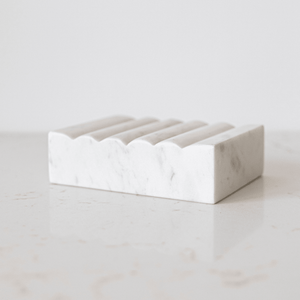 White marble scalloped soap dish with scalloped edge , minimalist bathroom accessory for countertop.